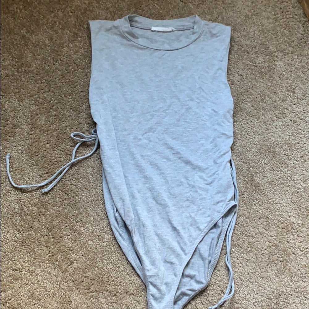 Grey body suit